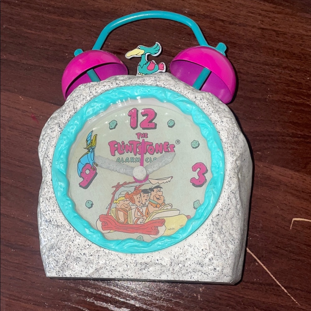 Flintstones Alarm Clock with Pink and Blue Accents non working conditions.